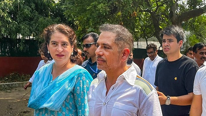 Priyanka Gandhi with her husband Robert Vadra and son Raihan Vadra - File Photo 